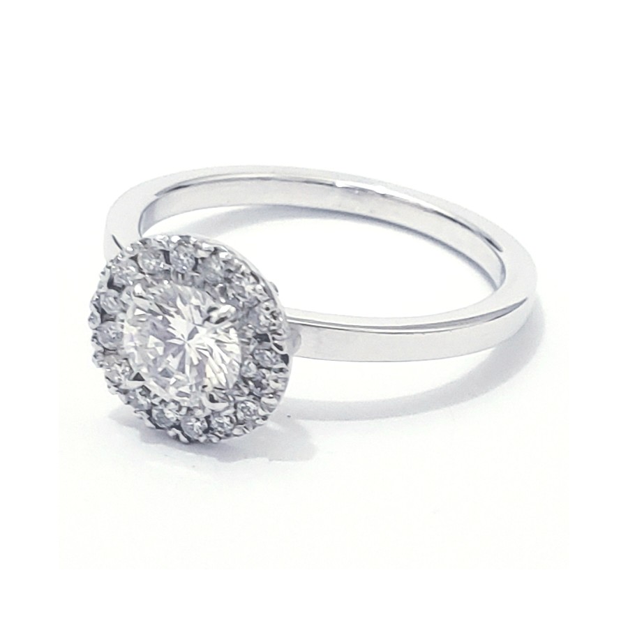 Anillo de Compromiso, oro blanco 14k, peso aprox 4gr,gema central 5.5mm, gemas laterales 1.2mm